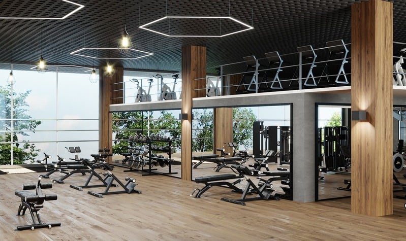 Well lit and modern gym with high end equipment