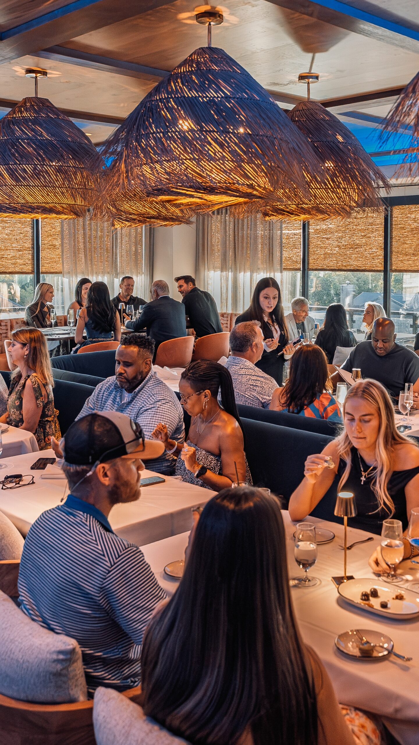Vertical Shot of lively and energetic rooftop restaurant